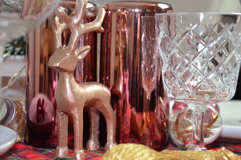 Rentier in Bronze mit Kerzen die spiegelglänzend sind